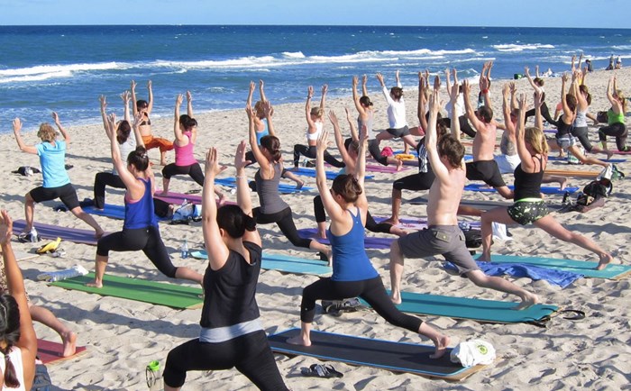 Yoga on the beach. Photo courtesy of 95thstreeetbeachyoga