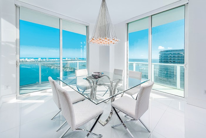 Dining area of a penthouse unit at Quantum on the Bay