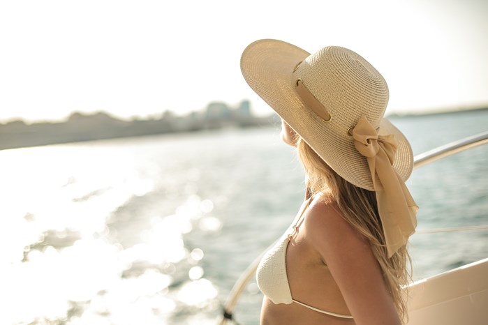 Woman on boat looking out over the water