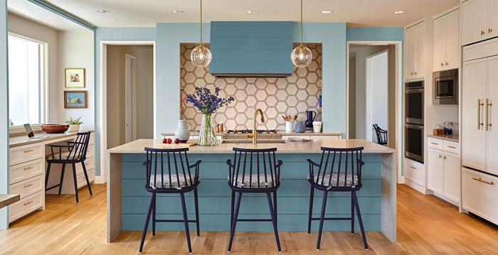 Contemporary kitchen with light, airy blues and natural tones
