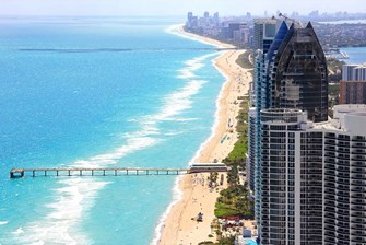 Comparing Miami’s Best Beachfront Neighborhoods: Sunny Isles Beach vs Miami Beach