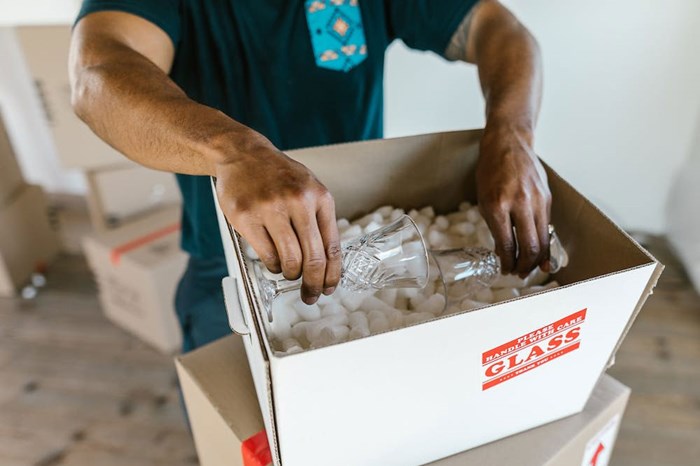 Unpacking fragile items - 32 Questions to Ask When Renting an Apartment: The Ultimate Checklist