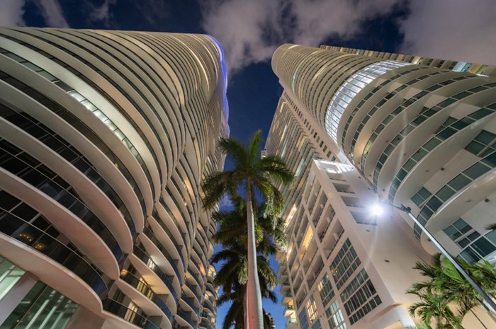 Looking up at two towers in downtown Miami