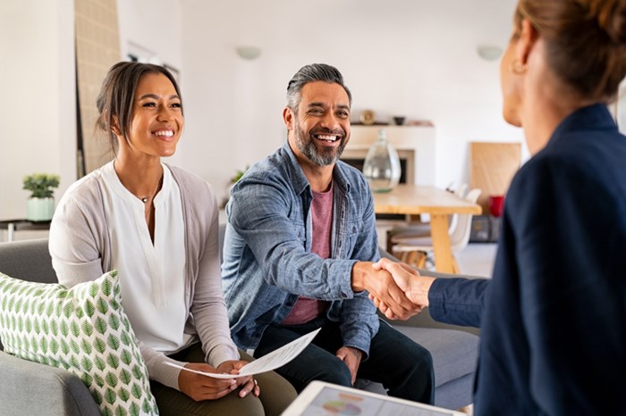 Couple confirming loan application