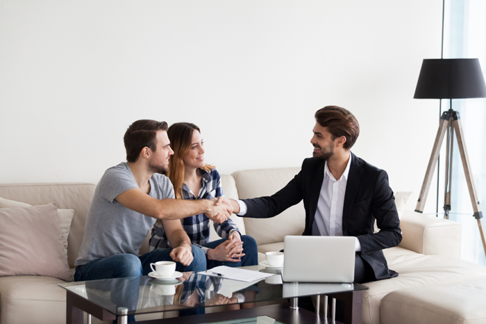 Couple with a Real Estate Agent